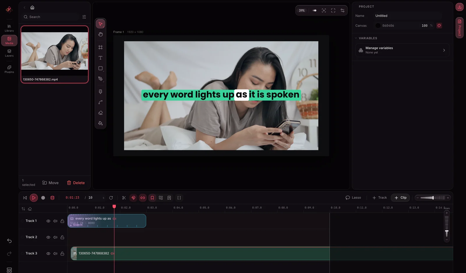 The AtomCut studio: a talking-head clip on the canvas, the caption above it on Track 1 and the video on Track 3 in the timeline
